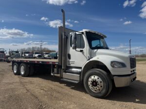 2011 Freightliner M2-106 T/A 24′ Deck Truck